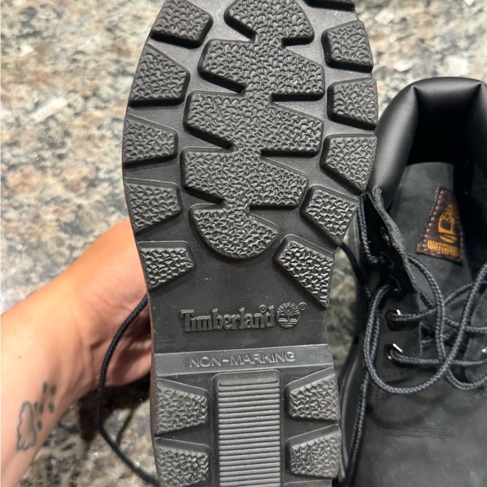 New kids size 13 black Timberland shoes. Never worn outside.